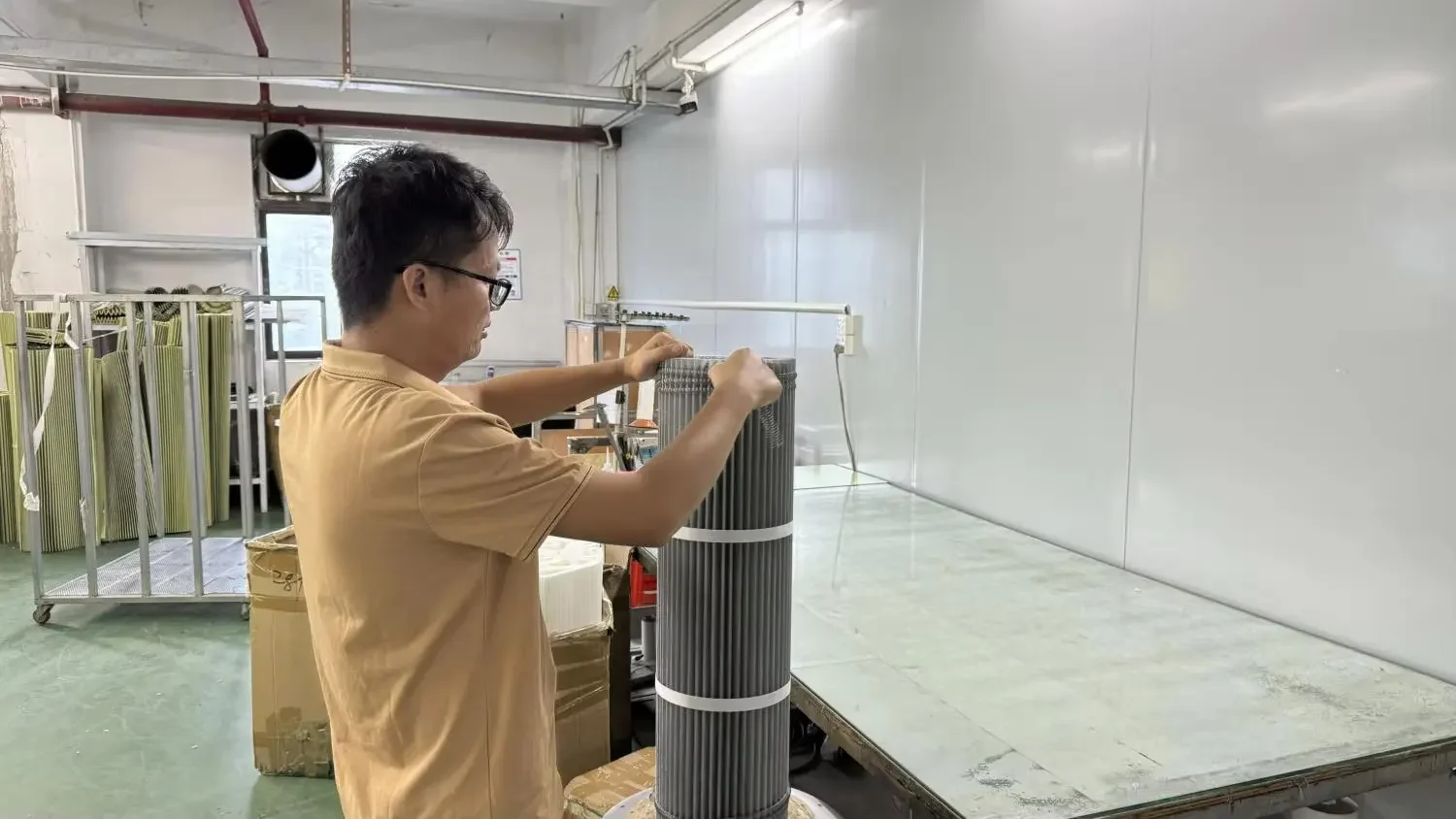 Filter cartridge assembly process at Guanlin